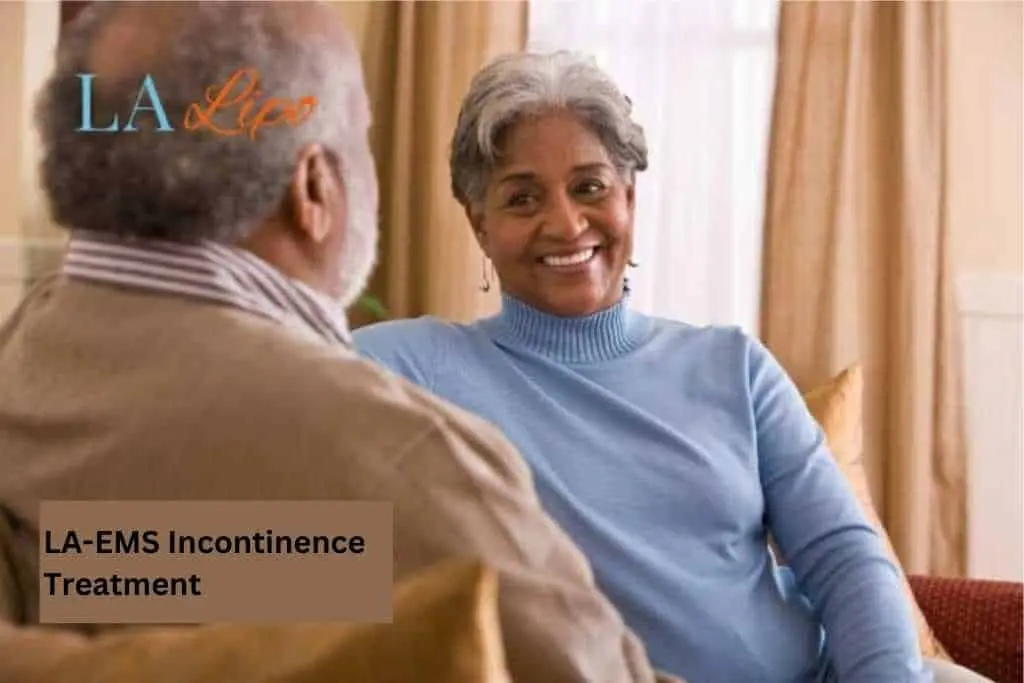 Couple sat smiling at each other - LA-EMS treatment Greater London (Hillingdon)